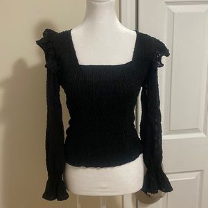 Black ruffled top